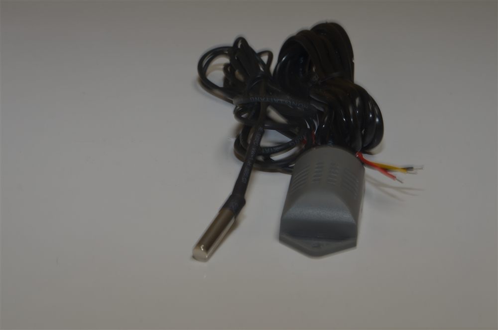 Stainless temperature probe and grey humidity sensor module on black cables